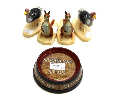 Four Carlton Ware Guiness advertising novelty figures dating circa 1950's, Ostrich G A 2197E, Kangaroo G A 21970 with a Guine