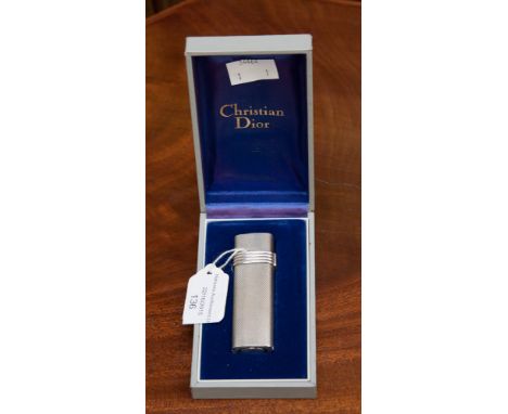 Christian Dior white metal cased cigarette lighter.