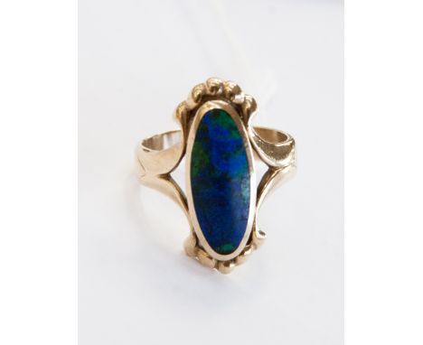 A black opal type 9ct yellow gold dress ring, gross weight approximately 9.6 grams.