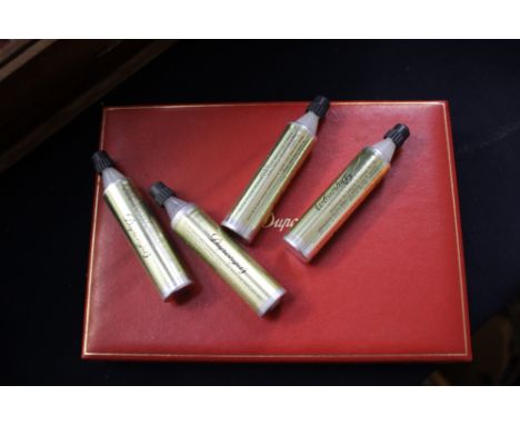 An S T Dupont fountain pen, gold plated with 18ct nib and a plated lighter, in fitted box, with instruction book.