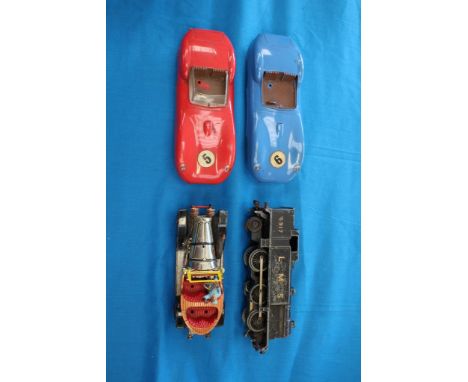 A Corgi Chitty Chitty Bang Bang car, with a LMS 6917 engine, and two circa 1960's Scalextric Jaguar cars. (4)