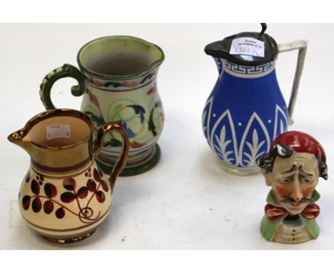 A Wade Heath lustre ware jug, a saltglaze stoneware jug (pewter lid), signed Glyn College jug (Denby) and a quirky Italian as