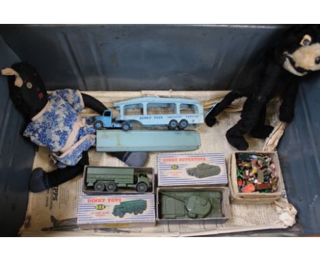 A tin trunk containing Dinky Toys 622 10 ton army truck and 651 Centurian Tank (boxed), Pullmore car transporter and ramp, wh