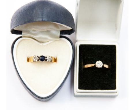 A diamond solitaire ring stamped 9ct, together with a sapphire and diamond ring, 18ct.