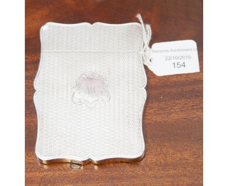 A white metal card case, Victorian, engine turned, unmarked.