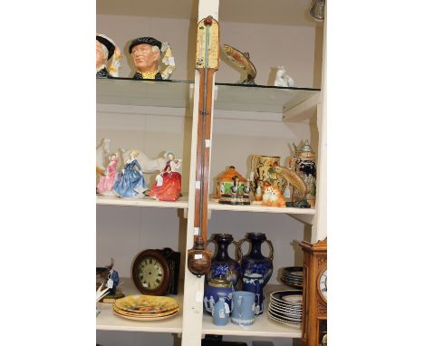 A 19th Century oak cased stick barometer