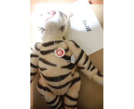 A boxed Steiff limited edition Tiger teddy bear, no 272 of 2010, model no 420689, with growler, with outer card packaging and