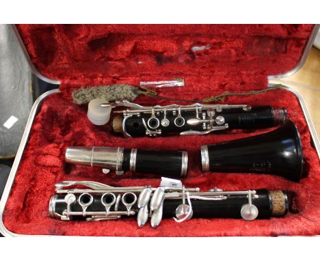 A Boosey and Hawkes clarinet and case.