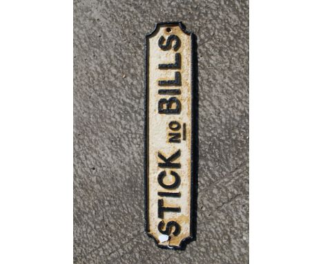 A cast iron 'Stick no Bills' sign, Great Northern style.