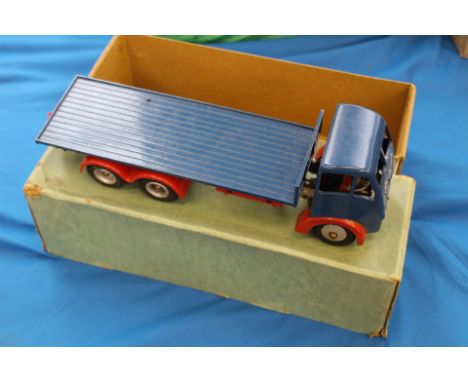 A boxed near mint example of a Shakleton Mecah nical scale model Foden FG platform type blue body, red chassis, with tools an