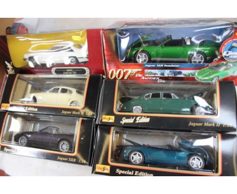 Four Maisto Special Edition 1-18 scale Jaguar, a Yat Ming Jaguar XJS and a Joy Ride 007 Die another Day James Bond XKR, all b