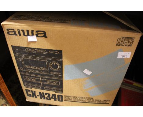 Aiwa compact disc stereo system and speakers.