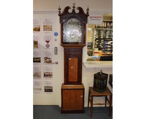 An early 19th century oak and mahogany eight day longcase clock, no maker's name but made in Sleaford, the white enamelled di