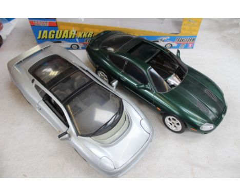 A Maisto 1/12 scale Jaguar XJ220 and a GR8RC radio control Jaguar XKR, boxed.