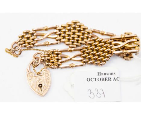 A 9ct rose gold gate bracelet with engraved padlock clasp, approximately 17 grams.