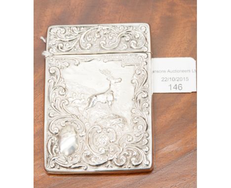 An Edwardian silver card case with embossed decoration of a stag, marked for Henry Wilkinson LH Birmingham 1906, length 10 cm