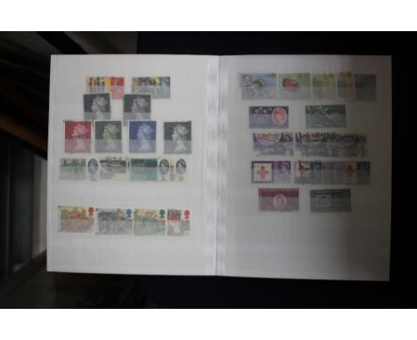 A blue album with stamp collection noting duplicated GB used pre decimal castles, different printings.