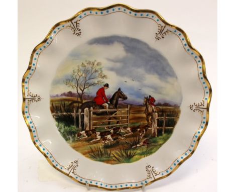 A Royal Crown Derby 'Hand painted hunting scene plate' (No 5) by S Scott, fluted edge.