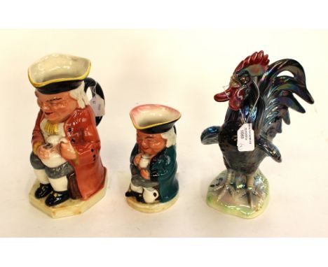 A Dutch ceramic cockerel and two Burlington toby jugs. (3)