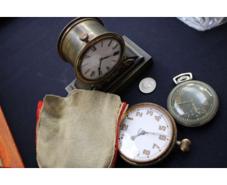 Two pocket watches, together with a small mantle clock.