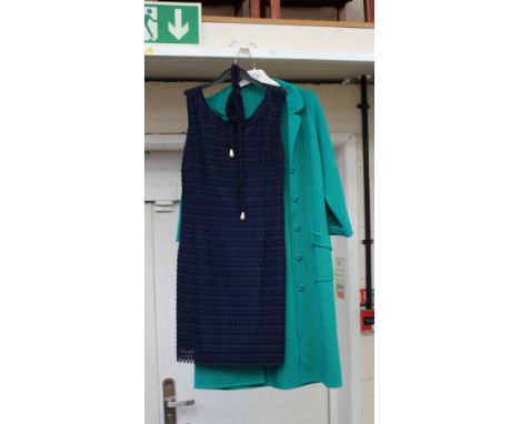 A navy lace mini dress with a belt with two pearl droppers, late 1960s by Tricovville together with a jade wool coat with two