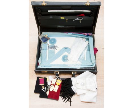 Five various Masonic Aprons, sashes, scarf and gloves, enamelled steward/patron medallions, silver chapter triangle, two othe