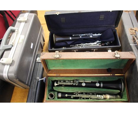   An Edwardian Excelsior Sonovods class - Hawkes & Son London 9422 - cased 'A' clarinet bakelite and a B flat clarinet - ebon