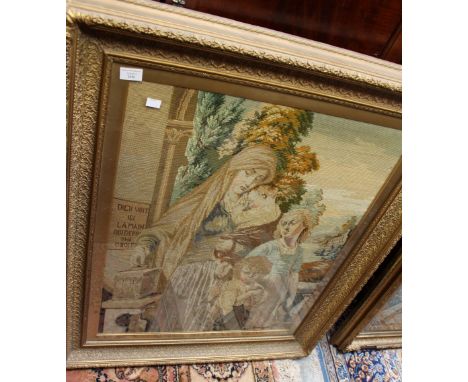 A late 19th Century large wool work tapestry depicting a mother and children in French rural setting, reading 'Dieu Voit ICI 