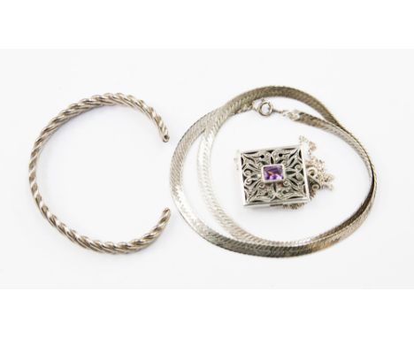 An amethyst and marcasite vinaigrette style pendant and chain, marked .925 and a chain and bangle. (3)