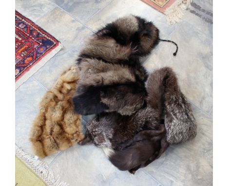 A fox fur cape and a fox fur with tails, together with a shaded musquash collar with a button fastening. (all 1930's/40's) (3