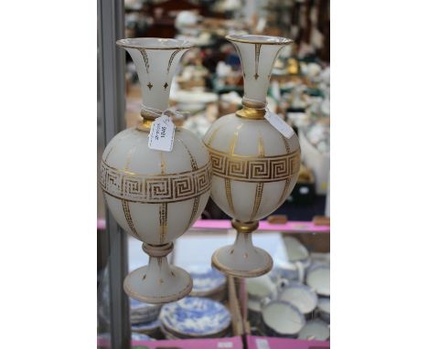 A pair of hand made early Victorian frosted glass bulbous vases, enamelled in gold with Egyptian key pattern, the bulbous cen