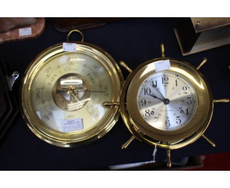 A Seth Thomas ships wheel clock, together with a brass framed barometer. (2)