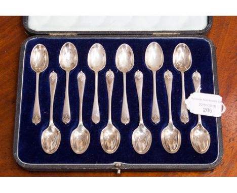 A cased set of twelve silver coffee spoons, Walker and Hall, Sheffield 1919