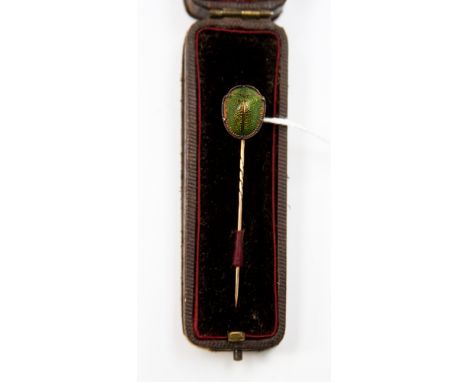 A late Victorian scarab buckle stick pin, cased, (Johnson Retailer of Derby with photograph). (2)