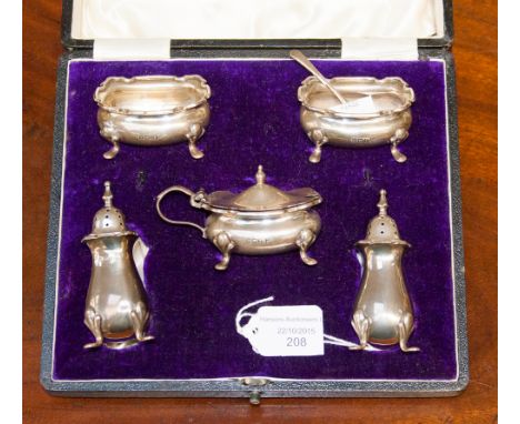 A boxed Walker & Hall six piece silver condiment set, comprising a pair of pepperettes, a covered mustard, a pair of salts an