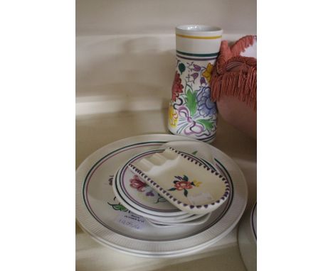 A Poole pottery vase, with three Poole plates, five Poole trinkets and an oval Poole ash tray (10)
