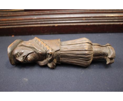 A 20th Century wooden nut cracker.