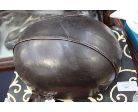 A 20th Century leather aviator's helmet.