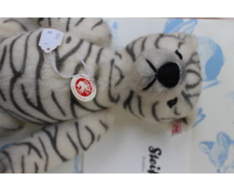 A boxed Steiff limited edition Zebra print teddy bear, no 951 of 2009, model no 420283, with growler, with certificate