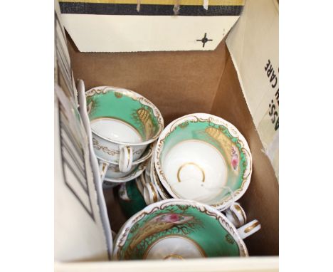 A Rockingham 'Cockyne' tea service comprising of cups, saucers, milk jug and cake plate, each decorated with roses on a green