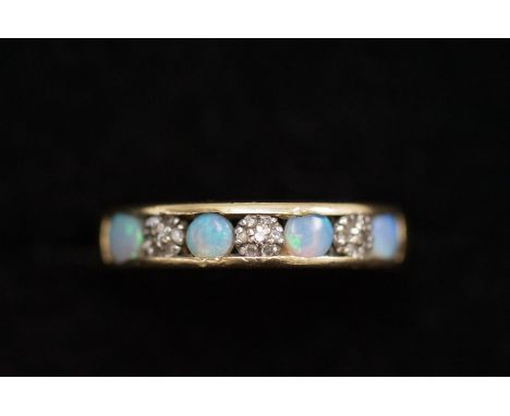 9ct Gold ring set with 4 Opals &amp; 3 illusion cut diamonds Size K 