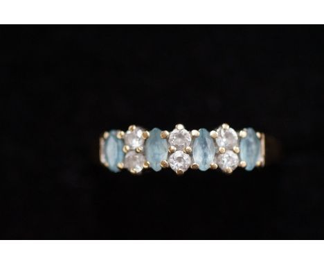 9ct Gold ring set with 6 moissanite diamonds &amp; 4 aqua marine stones Size K 