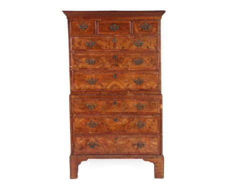 A George II Walnut and Crossbanded Chest on Chest, 2nd quarter 18th century, the cavetto cornice above three small drawers wi