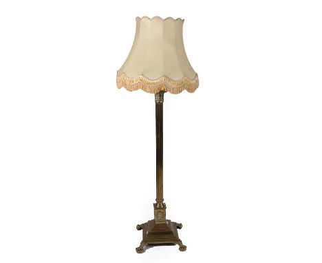 ~ An Early 20th Century Brass Adjustable Standard Lamp, on a Corinthian column support with leaf cast capital and square form