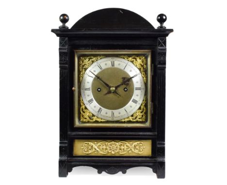 A German Quarter Striking Mantel Clock, circa 1890, arched case, gilt metal floral decorated front panel, 6-1/2-inch dial wit