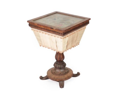 A Victorian Rosewood Work Table, mid 19th century, the hinged lid with ratchet support, removable rest and original floral ne