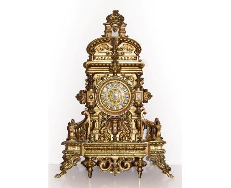 An Elaborate Gilt Metal Striking Mantel Clock, circa 1890, the imposing case with a gallery pediment and base, scroll and gri