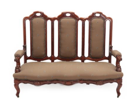 A Victorian Mahogany Framed Three-Seater Sofa, late 19th century, recovered in close-nailed floral brown fabric, the moulded 