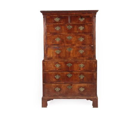 A George II Walnut, Crossbanded and Oak Sided Chest on Chest, 2nd quarter 18th century, the dentil cornice above two short an
