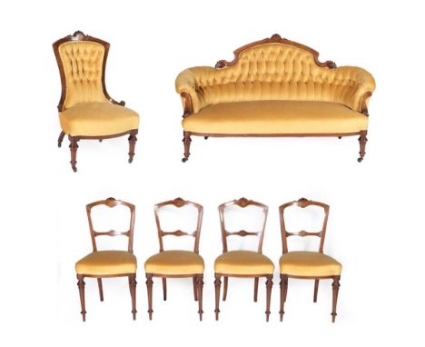 A Victorian Walnut, Boxwood Strung and Marquetry Inlaid Six Piece Salon Suite, circa 1880, recovered in button yellow velvet,